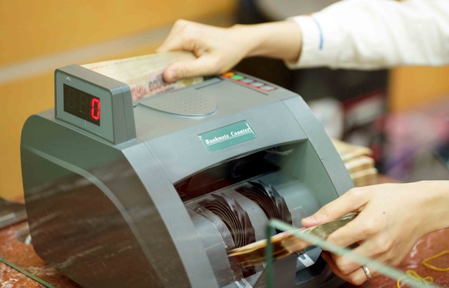 Doanh nghiệp trả lương bằng tiền mặt trên 5 triệu đồng có được trừ vào chi phí? - Ảnh 1.