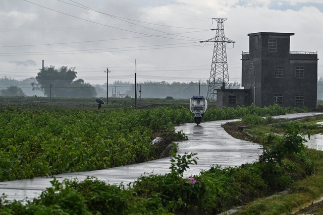 Mưa to g&acirc;y chết người, Trung Quốc ban h&agrave;nh cảnh b&aacute;o - Ảnh 1.
