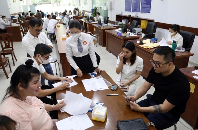 Chuyển phòng công chứng sang tư nhân Đảm bảo quyền lợi cho người dân - Ảnh 1.