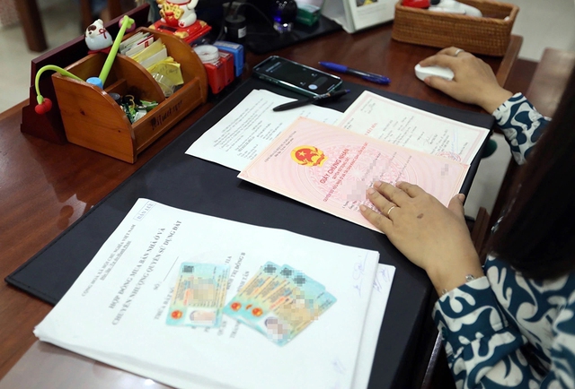 Chuyển phòng công chứng sang tư nhân Đảm bảo quyền lợi cho người dân - Ảnh 2.