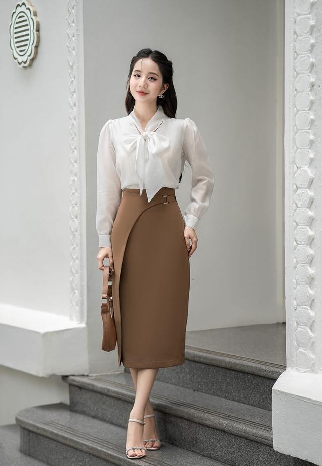Áo sơ mi thắt nơ , điểm nhấn thanh lịch cho phong cách công sở hiện đại - Ảnh 8. Áo sơ mi thắt nơ , điểm nhấn thanh lịch cho phong cách công sở hiện đại - Ảnh 8.