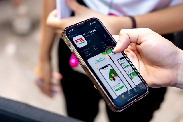 FE CREDIT mang ứng dụng tài chính đa nhiệm đến Ngày không tiền mặt 2025 - Ảnh 2.