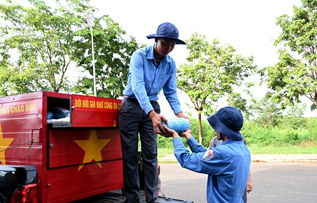 Bình Phước: Đón 80 hài cốt liệt sĩ Việt Nam từ Campuchia trở về quê hương - Ảnh 3.