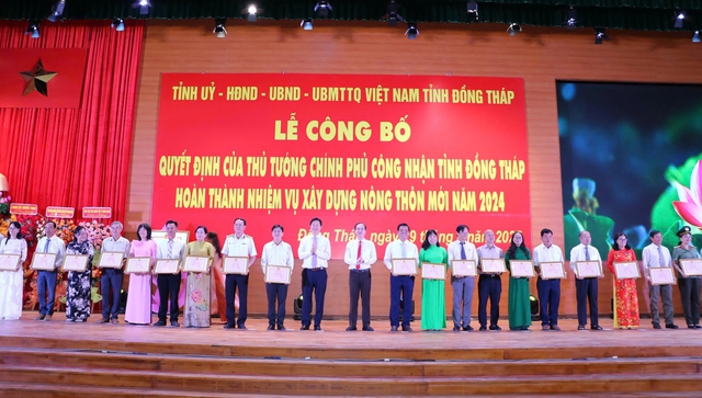 Đồng Tháp - Tiền Giang đã được công nhận hoàn thành xây dựng nông thôn mới - Ảnh 4.