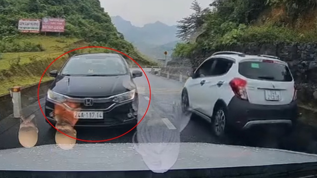Tài xế lái xe chạy ngược chiều trên đèo, còn thách thức ‘cứ kệ tôi’ - Ảnh 1.