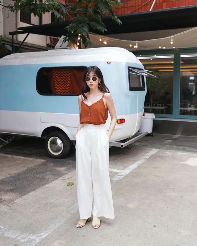 Quần tây, 'vũ khí' tôn dáng của quý cô hiện đại- Ảnh 2.