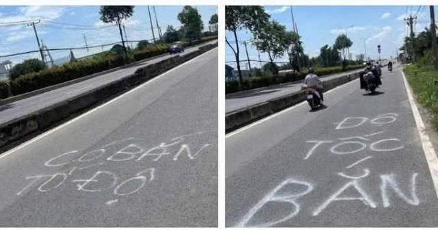 CSGT TP.HCM xóa dòng chữ 'bắn tốc độ' phun trên mặt đường Lê Quang Đạo - Ảnh 1.