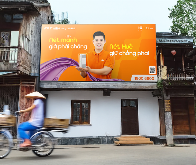 FPT ‘phủ cam’ toàn quốc: 1.000 lời chào đậm bản sắc Việt bằng quảng cáo sáng tạo - Ảnh 3.