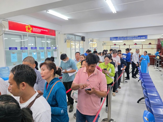 Kh&aacute;nh h&ograve;a quyết t&acirc;m lọai bỏ c&ograve; l&agrave;m giấy tờ trong dịch vụ h&agrave;nh ch&iacute;nh c&ocirc;ng - Ảnh 1.