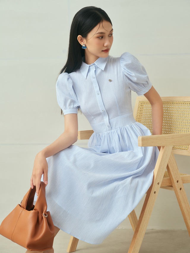 Váy sơ mi là điểm nhấn cho phong cách chuyên nghiệp, hiện đại- Ảnh 9. Váy sơ mi là điểm nhấn cho phong cách chuyên nghiệp, hiện đại- Ảnh 9.