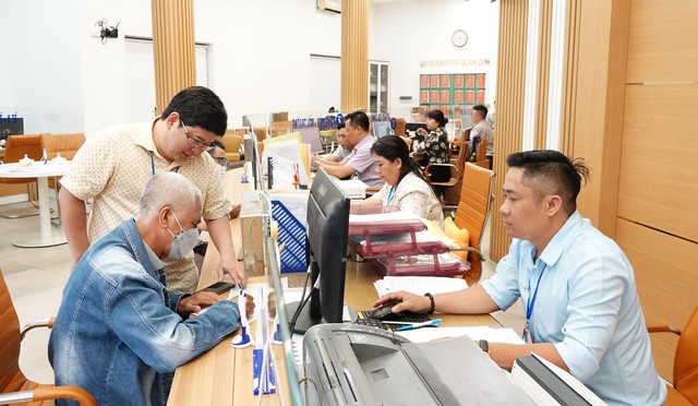 Cấp xã sau sáp nhập: Quyền nhiều hơn, trách nhiệm lớn hơn - Ảnh 1.