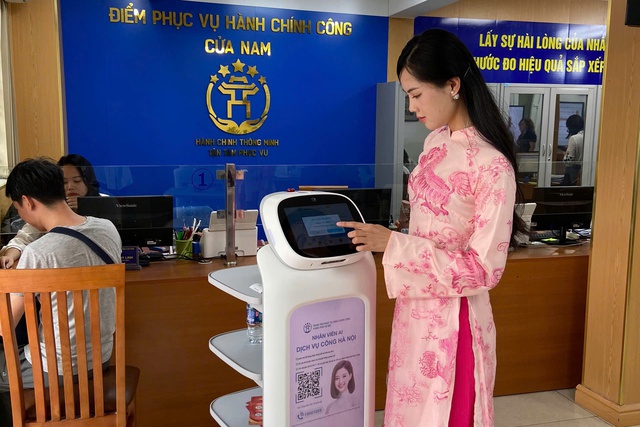 Hà Nội triển khai 15 tiện ích miễn phí tại các điểm phục vụ hành chính công- Ảnh 1.