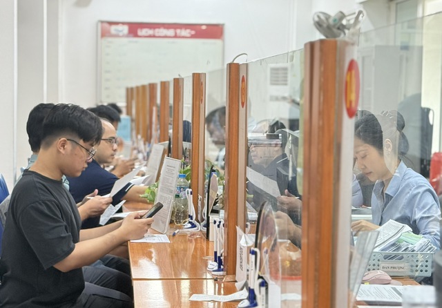 Người lao động đối diện làn sóng thất nghiệp- Ảnh 1.