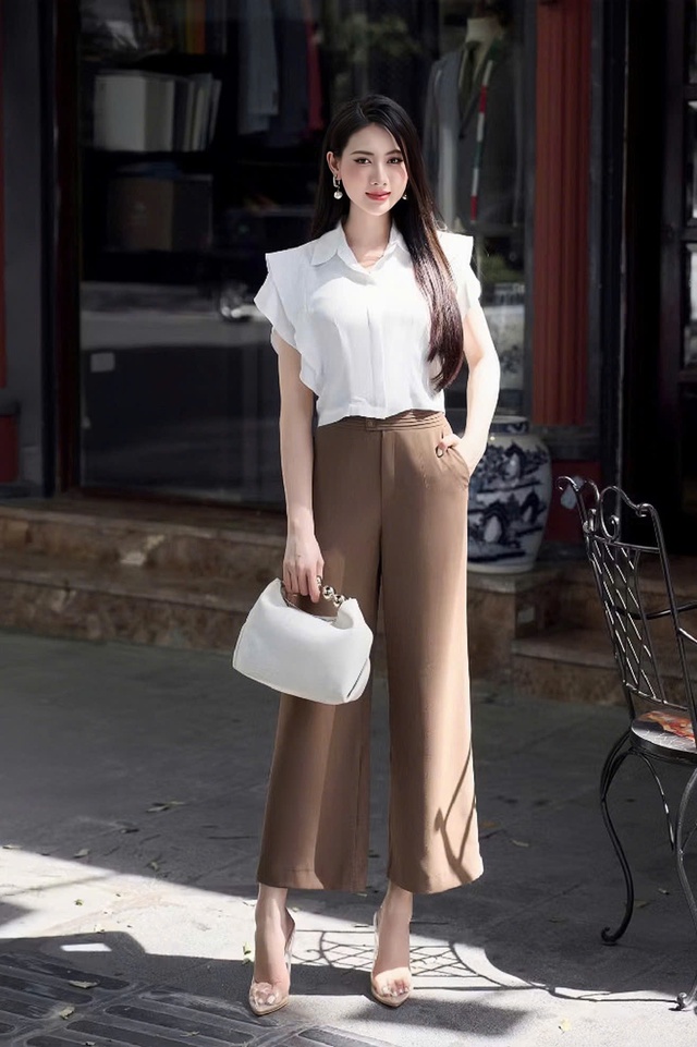 Thanh lịch nơi công sở với áo tay bèo sát nách Thanh lịch nơi công sở với áo tay bèo sát nách