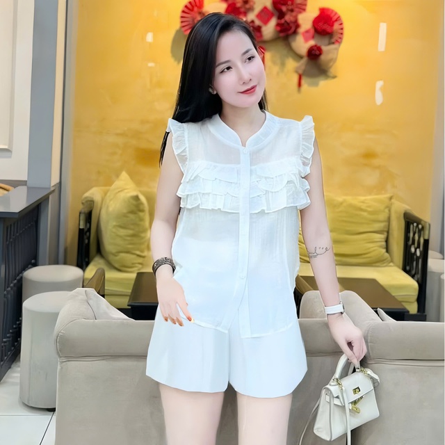 Thanh lịch nơi công sở với áo tay bèo sát nách- Ảnh 5. Thanh lịch nơi công sở với áo tay bèo sát nách- Ảnh 5.