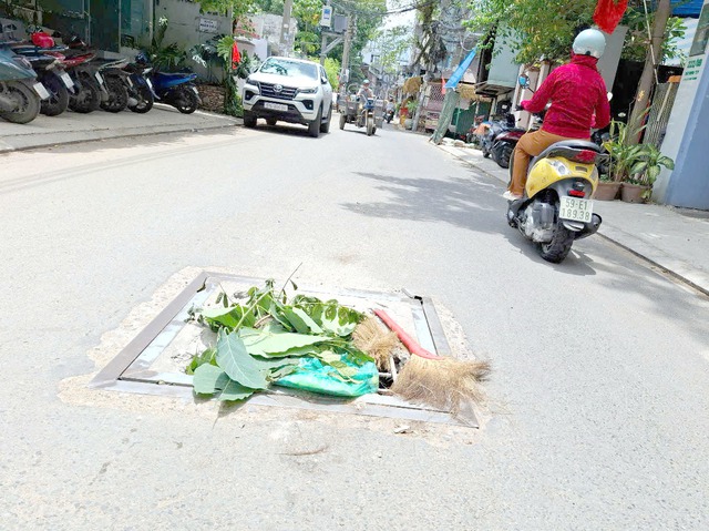 Hố ga nguy hiểm - Ảnh 2.