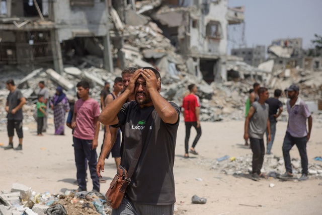 Hàng chục người chết ở Gaza do chiến sự và nạn đói gia tăng - Ảnh 1.