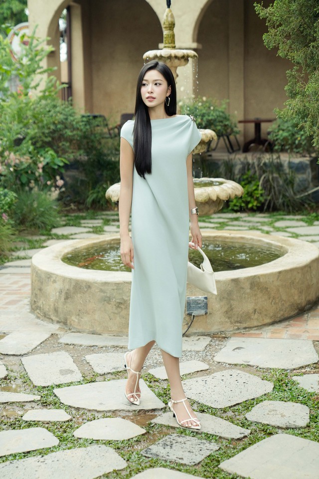 Đẹp dịu dàng mà vẫn cá tính, chọn ngay kiểu váy midi cho mùa này - Ảnh 1.