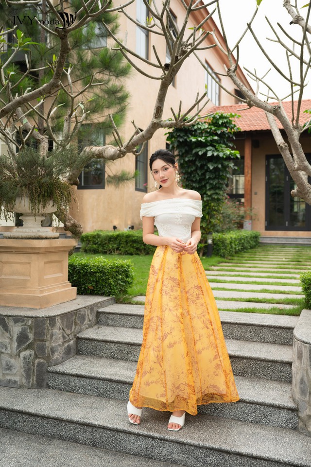 Đẹp dịu dàng mà vẫn cá tính, chọn ngay kiểu váy midi cho mùa này - Ảnh 8.