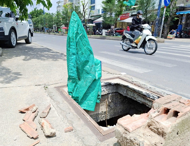 Hố ga nguy hiểm - Ảnh 1.