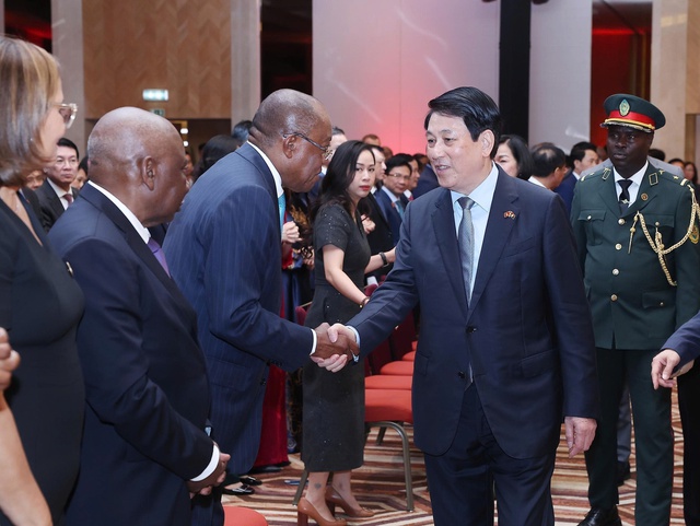 Kỷ niệm 50 năm thiết lập quan hệ ngọai giao Việt Nam - Angola tại Luanda - Ảnh 1.