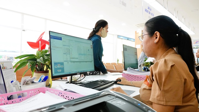 TP.HCM hướng tới đột phá cắt giảm giấy tờ - Ảnh 1.