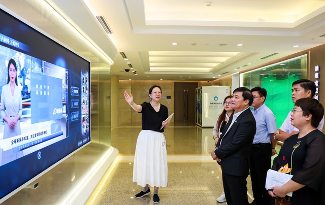 B&aacute;o Thanh Ni&ecirc;n trao đổi hợp t&aacute;c c&ocirc;ng nghệ truyền th&ocirc;ng số với b&aacute;o ch&iacute; Thượng Hải- Ảnh 1.