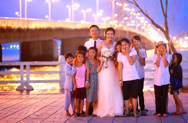 Cuộc hội ngộ bất ngờ b&ecirc;n ảnh cưới 12 năm trước của vợ chồng anh Nghĩa - Ảnh 2.