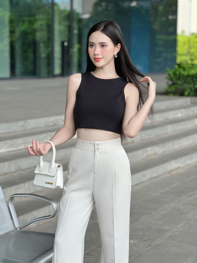 Tỉ lệ vàng tôn dáng với áo crop top và quần cạp cao 2026 - Ảnh 6. Tỉ lệ vàng tôn dáng với áo crop top và quần cạp cao 2026 - Ảnh 6.
