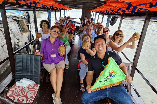 Tour tết phập phồng v&igrave; vi r&uacute;t Nipah- Ảnh 1.