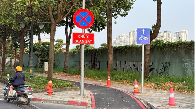 Xe m&aacute;y đi v&agrave;o l&agrave;n ưu ti&ecirc;n xe đạp ở TP.HCM c&oacute; bị CSGT xử phạt? - Ảnh 4.