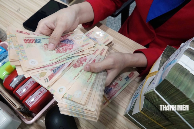 Yêu cầu ngân hàng giảm lãi suất huy động 0,5% và cho vay 1,5 - 2%/năm- Ảnh 1.