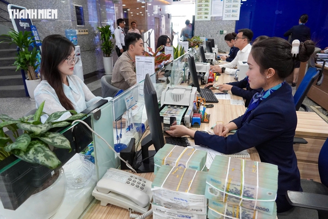 Hàng loạt ngân hàng giảm lãi vay- Ảnh 2.