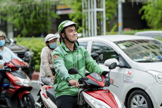 Grab mở rộng chương trình Điều Ước Sau Tay Lái, san sẻ khó khăn với tài xế - Ảnh 1.