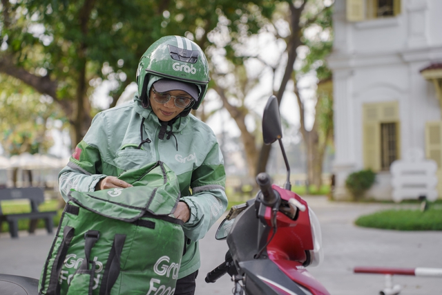 Grab mở rộng chương trình Điều Ước Sau Tay Lái, san sẻ khó khăn với tài xế - Ảnh 2.