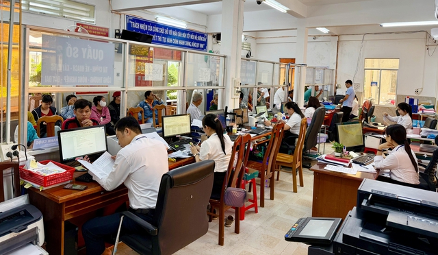 Cà Mau nối dữ liệu, hướng tới giải quyết hồ sơ tốt hơn cho người dân - Ảnh 1.