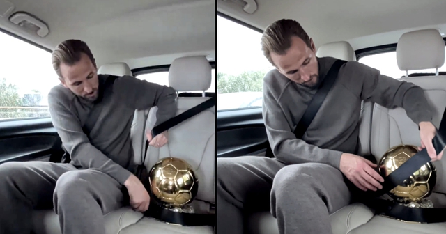 Video Harry Kane thắt dây an toàn khi chở Quả bóng vàng về nhà ‘gây sốt’ - Ảnh 1.