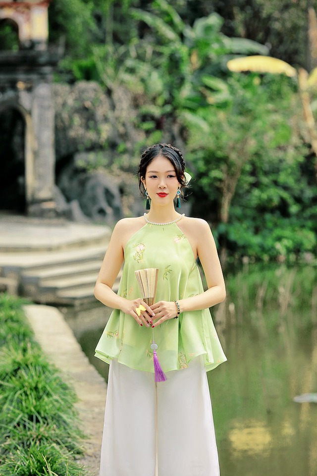 Sắc xanh lá xuất hiện trên những thiết kế truyền thống đón xuân rực rỡ- Ảnh 4. Sắc xanh lá xuất hiện trên những thiết kế truyền thống đón xuân rực rỡ- Ảnh 4.