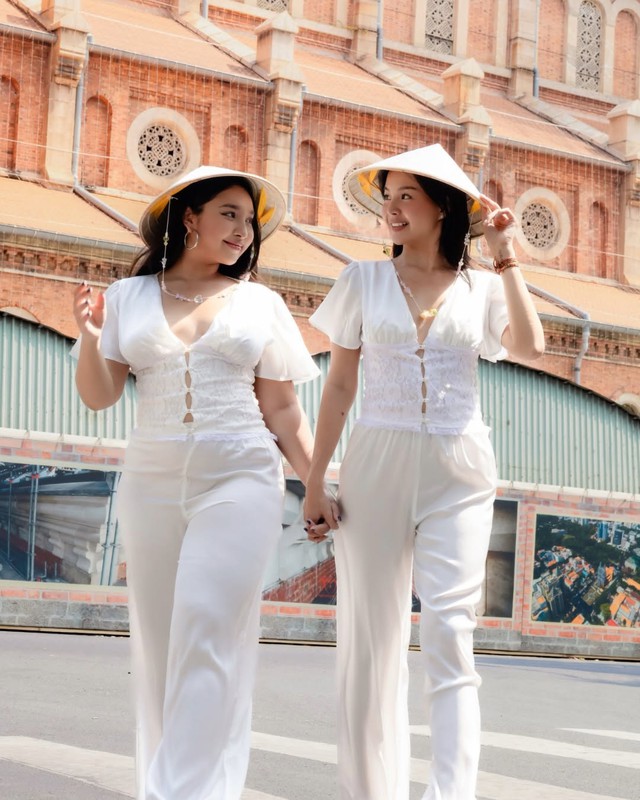 Du xuân duyên dáng cùng chiếc nón lá truyền thống- Ảnh 5.