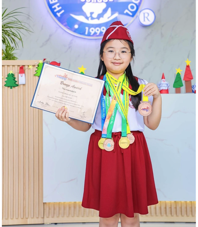 Những huy chương toán học của học sinh lớp 4 khởi đầu từ cửa hàng đồ điện - Ảnh 1.