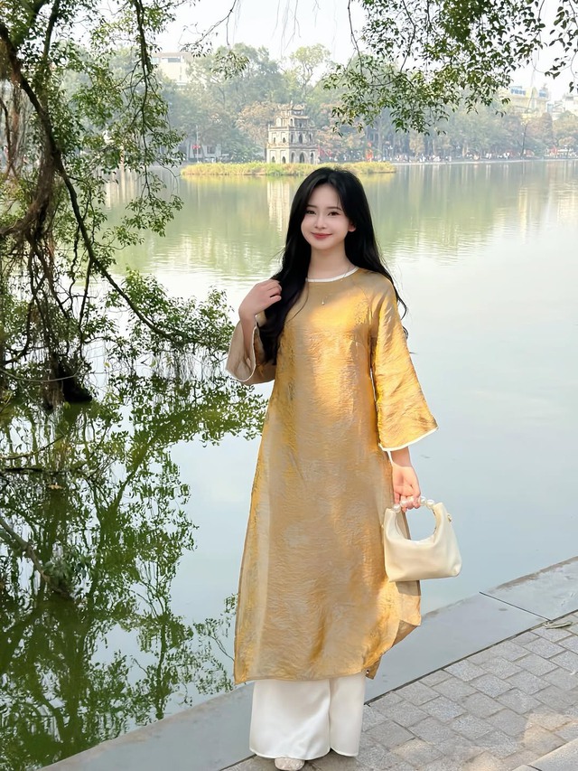 Tôn vinh trang phục ngày tết với túi ngọc trai kiêu sa- Ảnh 3.