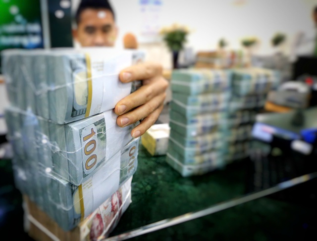 Gi&aacute; USD h&ocirc;m nay 19.3.2026: Ng&acirc;n h&agrave;ng tăng gi&aacute; đ&ocirc; trong khi EUR, bảng Anh giảm mạnh- Ảnh 1.