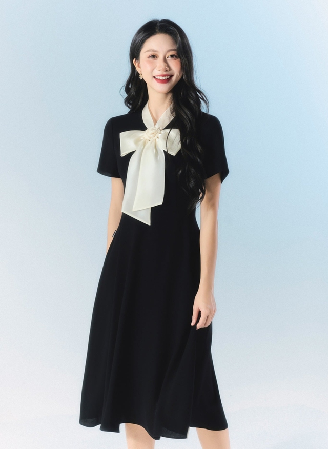 Nâng tầm phong cách đi làm, đi tiệc từ những kiểu váy midi sang trọng- Ảnh 10. Nâng tầm phong cách đi làm, đi tiệc từ những kiểu váy midi sang trọng- Ảnh 10.