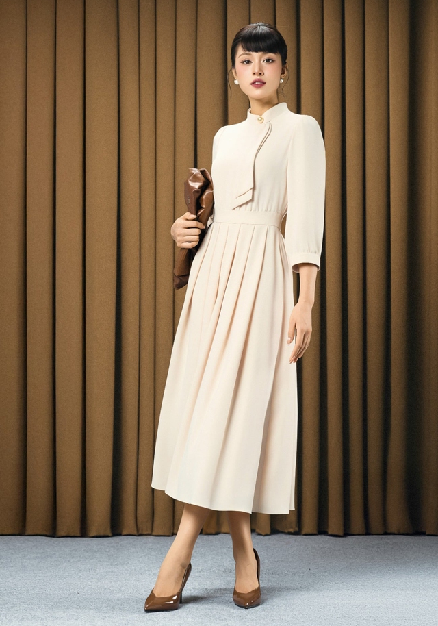 Nâng tầm phong cách đi làm, đi tiệc từ những kiểu váy midi sang trọng- Ảnh 7. Nâng tầm phong cách đi làm, đi tiệc từ những kiểu váy midi sang trọng- Ảnh 7.