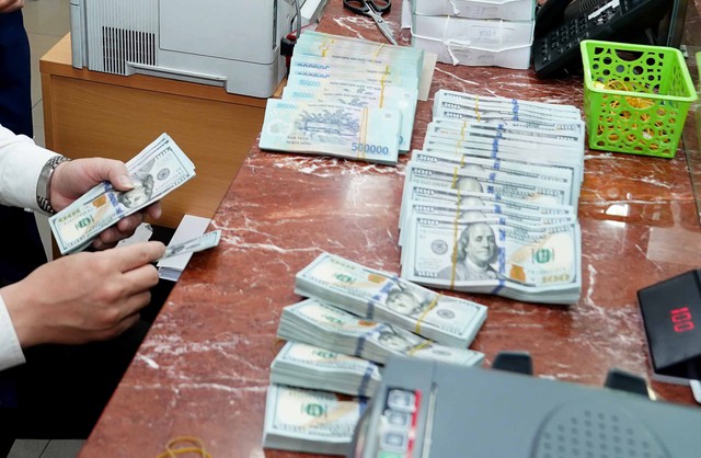 Gi&aacute; USD h&ocirc;m nay 13.3.2026: Ng&acirc;n h&agrave;ng tăng mạnh gi&aacute; mua v&agrave;o- Ảnh 1.