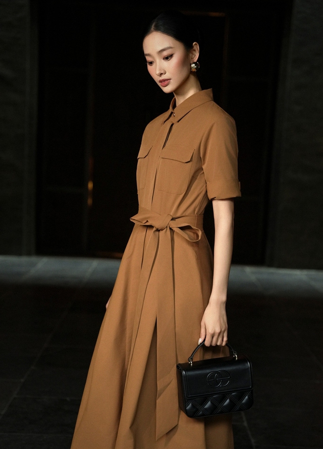 Nâng tầm phong cách đi làm, đi tiệc từ những kiểu váy midi sang trọng- Ảnh 3. Nâng tầm phong cách đi làm, đi tiệc từ những kiểu váy midi sang trọng- Ảnh 3.