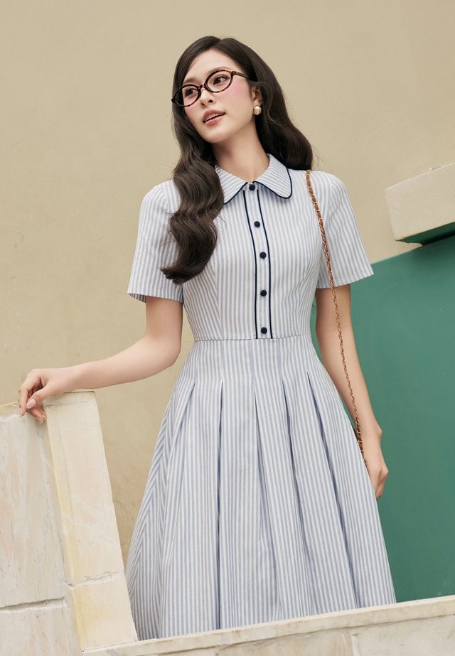 Nâng tầm phong cách đi làm, đi tiệc từ những kiểu váy midi sang trọng- Ảnh 1. Nâng tầm phong cách đi làm, đi tiệc từ những kiểu váy midi sang trọng- Ảnh 1.