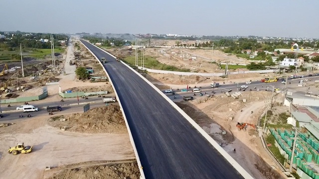 Thảm nhựa cầu cạn vượt quốc lộ 13 v&agrave; cầu B&igrave;nh Gởi đường V&agrave;nh đai 3 TP.HCM- Ảnh 1.