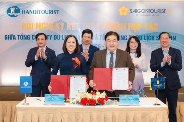 Hai tổng công ty du lịch hàng đầu ký biên bản ghi nhớ hợp tác - Ảnh 1.