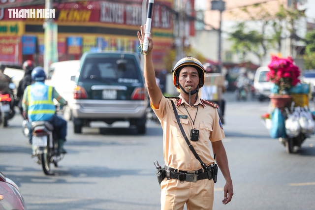 Vì sao TP.HCM giới hạn xe máy chỉ được chạy 50 km/giờ trên quốc lộ 22 cũ? - Ảnh 1.